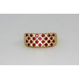 A 14ct yellow gold ruby and diamond set ring, approx. 5.3gr, (O).