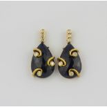 A pair of matching 18ct gold natural sapphire and diamond earrings. Earring L. 2.5cms.