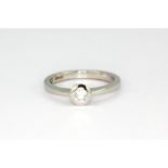 A 950 platinum solitaire ring set with a brilliant cut diamond, approx. 0.25ct, (L.5).