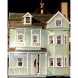 An impressive model dolls house, 54 x 44 x 60cm.