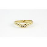 A 9ct yellow gold diamond set wishbone ring, approx. 2gr, (L.5).