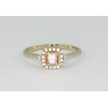 An 18ct white gold ring set with an 0.35ct princess cut natural fancy light pink diamond