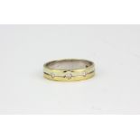 A 9ct yellow gold ring set with three brilliant cut diamonds, approx. 3gr, (O.5).