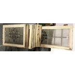 A group of leaded glass window frames, 38 x 106cm. and 38 x 50cm.