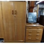 A 1960's G-PLAN wardrobe, W. 91cm. H. 175. with a matching four drawer dressing table.