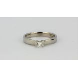 A platinum solitaire ring set with an approx. 0.20ct princess cut diamond, (K.5).