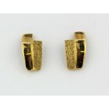A pair of 9ct yellow gold earrings, L. 1cm.