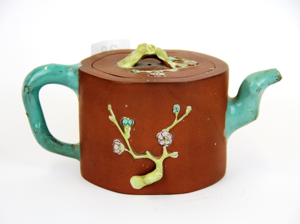 A Chinese hand painted and relief decorated terracotta teapot. Condition: A/F. - Image 2 of 3