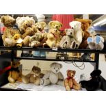 A large collection of Dean's rag book collectable teddy bears, some with certificates and badges.