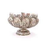 An Indian hammered white metal rose bowl, Dia. 16cm. H. 11cm.