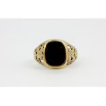 A 9ct yellow gold onyx set signet ring, approx. 3.2gr, (U).