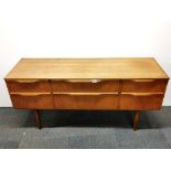 A 1970's teak sideboard, W. 147cm. H. 66cm.