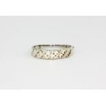 A 9ct white gold stone set ring, approx. 1.2gr, (N.5).