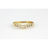 A 9ct yellow gold stone set wishbone ring, approx. 1.7gr, (V).