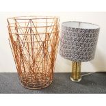 Four large copperised metal baskets and an attractive contemporary table lamp, H. 50cm. Baskets size