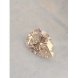 An unmounted 2.05 pear cut diamond, with IDRC certificate, colour F/G, clarity SI.