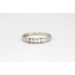 An 18ct white gold five diamond set ring, approx. 3.6gr, (S).