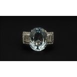 A very stylish Art Deco style 18ct white gold ring (stamped 750) set with a large 6.5ct aqua