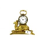 A Victorian gilt brass mantle clock, H. 17cm.