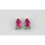 A pair of 14ct white gold earrings set with pear cut pink sapphires and diamonds, L. 0.6cm.