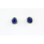 A pair of 925 silver sapphire set stud earrings.