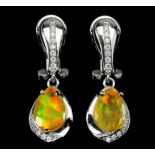 A pair of 925 silver drop earrings set with pear cut opals and white stones, L. 2.6cm.