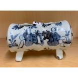 An interesting Chinese hand painted porcelain item standing on two feet possibly a brush washer,