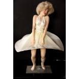 A porcelain figure of Marilyn Monroe, H. 43cm.