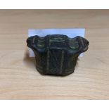 A bronze dagger ommel probably Roman, 2 x 2cm (check size)