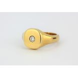 A large size heavy gent's9ct yellow gold single diamond signet ring (worn full hallmark). (Z +4).