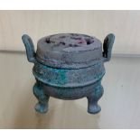 An small interesting Chinese bronze censer with mutton fat jade cover, H. 6cm.