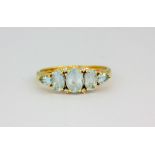 A 9ct yellow gold aquamarine and diamond set ring, approx. 2.3gr, (T.5).