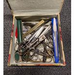 A box of vintage scissors.