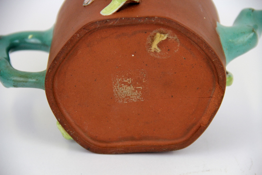 A Chinese hand painted and relief decorated terracotta teapot. Condition: A/F. - Image 3 of 3