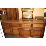 An impressive reproduction country oak sideboard, W. 210. H. 85cm.