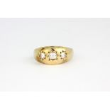 A gentleman's 9ct yellow gold stone set gypsy ring, approx. 2.5gr, (N.5). TEST STONES I THINK THEY