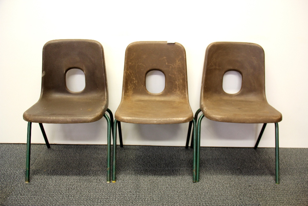 Three 1960's children's stacking chairs, H. 58cm.