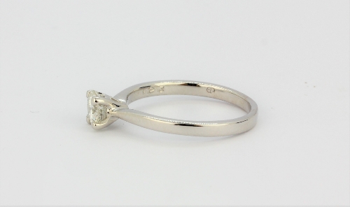 An 18ct white gold solitaire ring set with a brilliant cut diamond, approx. 0.23ct, (M). - Image 2 of 2