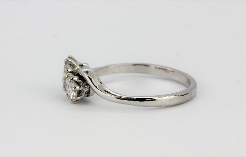 A platinum diamond set crossover ring, approx. 0.60ct, (N). - Image 2 of 2