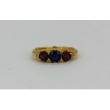 An 18ct yellow gold (stamped 18) ring set with diamonds and other stones, (K).