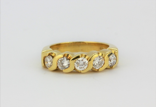 An 18ct yellow gold (stamped 18k) ring set with five brilliant cut diamonds, approx. 0.75ct, (H.5).