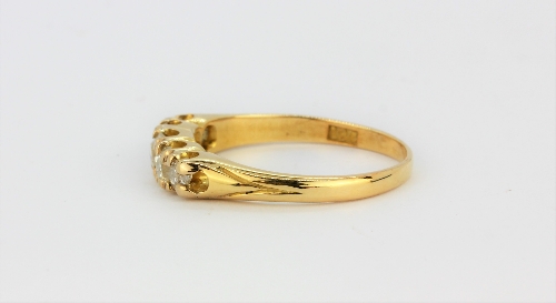 An 18ct yellow gold ring set with five graduated old cut diamonds, (P.5). - Image 2 of 2