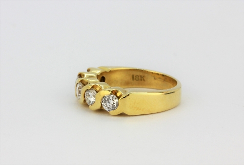 An 18ct yellow gold (stamped 18k) ring set with five brilliant cut diamonds, approx. 0.75ct, (H.5). - Image 2 of 2