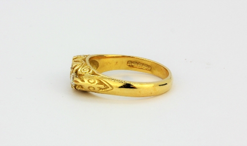 An 18ct yellow gold ring set with brilliant cut diamonds, approx. 0.68ct, (O). - Image 2 of 2