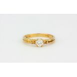A 9ct yellow gold brilliant cut diamond set solitaire ring, approx. 0.38ct, (N).