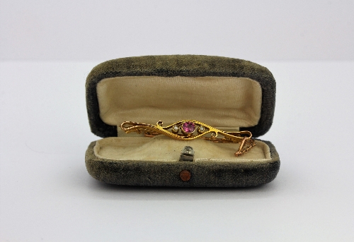 A boxed antique yellow metal (tested minimum 9ct gold) pink tourmaline and seed pearl set brooch, L. - Image 3 of 3