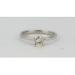 An 18ct white gold solitaire ring set with a brilliant cut diamond, approx. 0.23ct, (M).