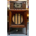 A large wooden cased freestanding Hollybush radio, 42cm x 22cm x 17.5cm.