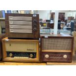 A wooden cased Coplana radio together with a wooden cased Ekco radio model A147 together with a