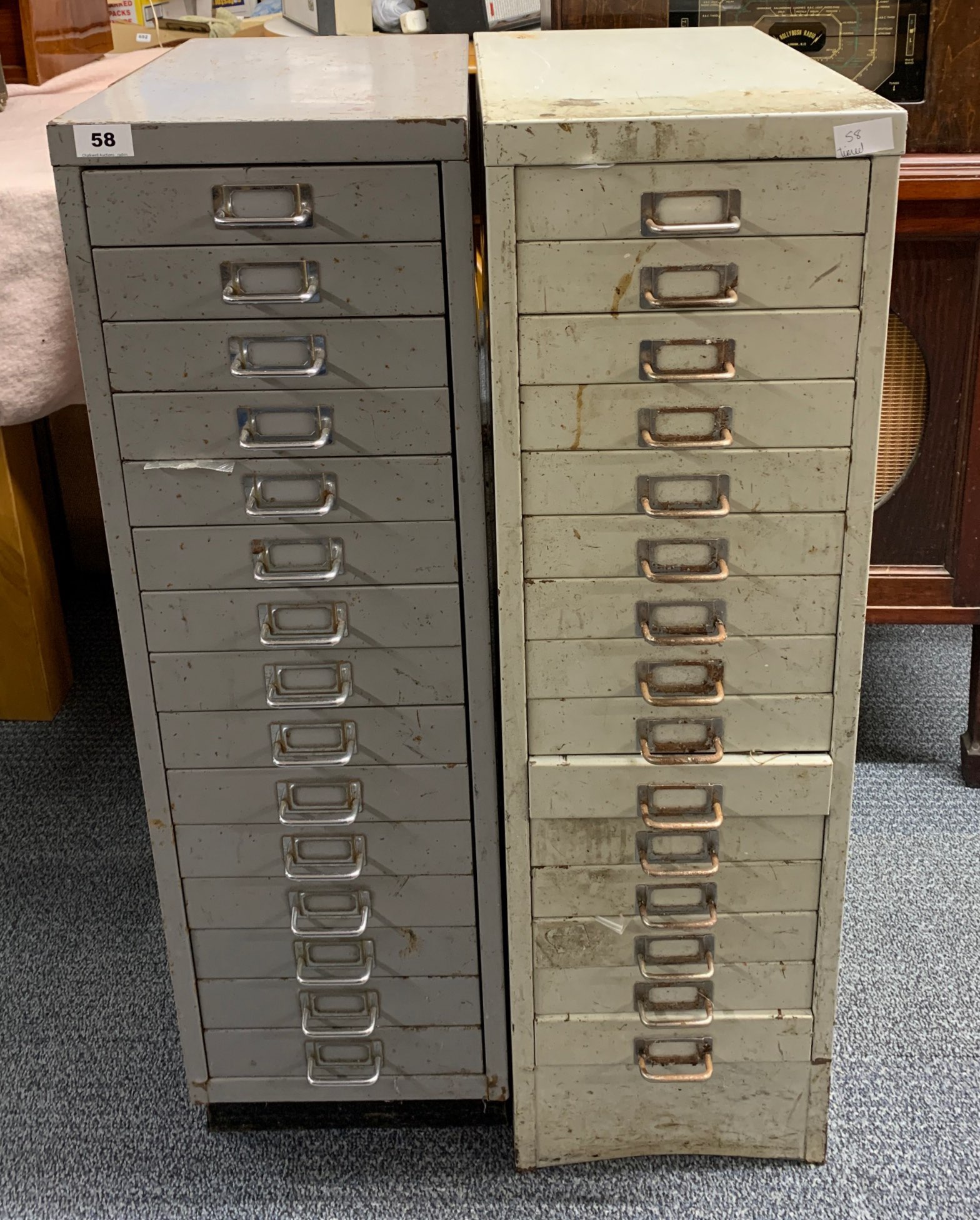 Two filing cabinets with a quantity of miscellaneous radio &/or Tv items.